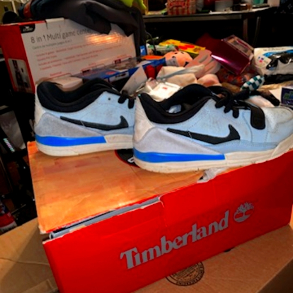 Blue and black kids nikes